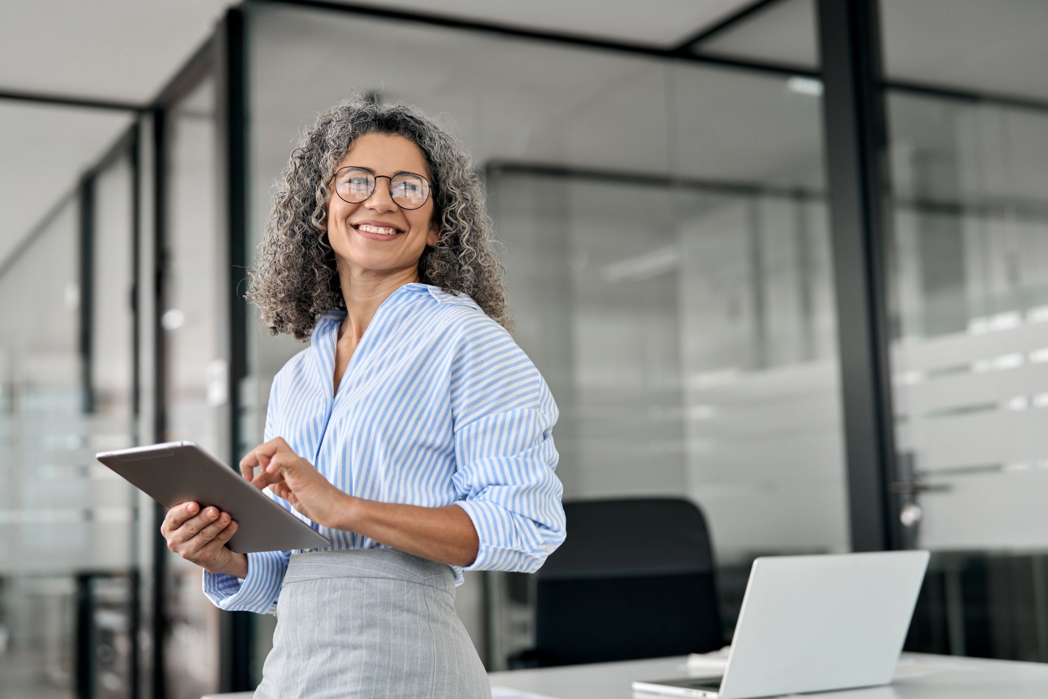 Smiling mature professional business woman